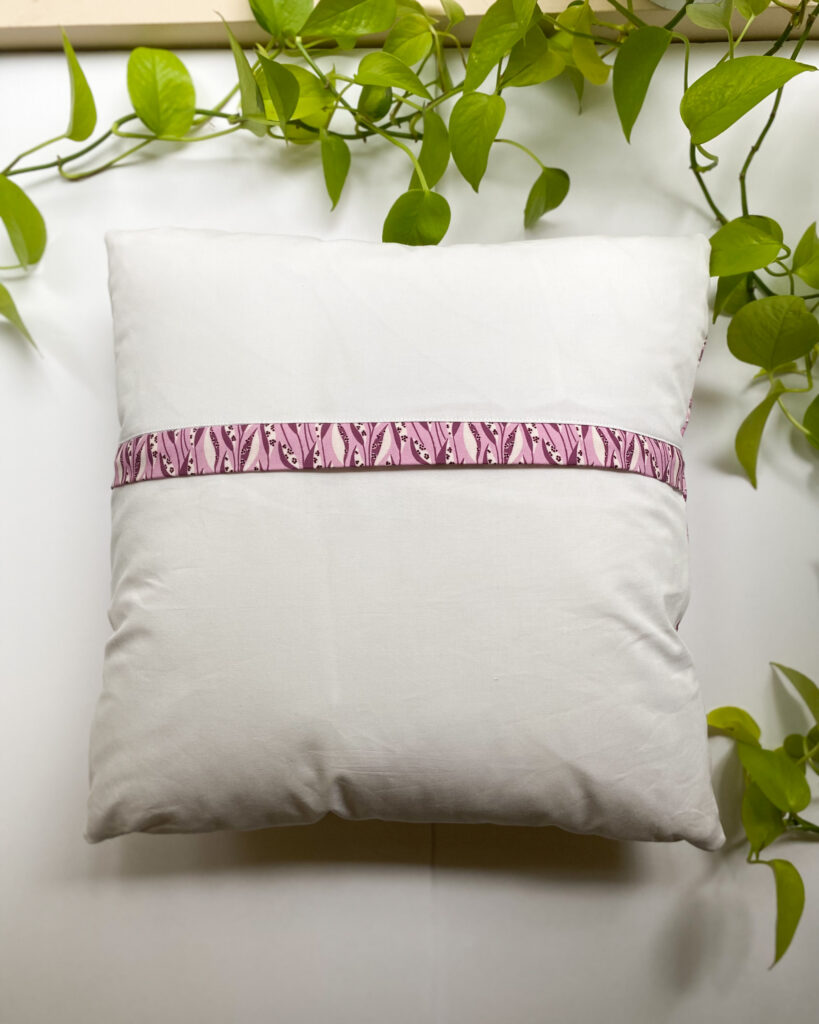 Finished 18-inch pillow with zipper back and insert added