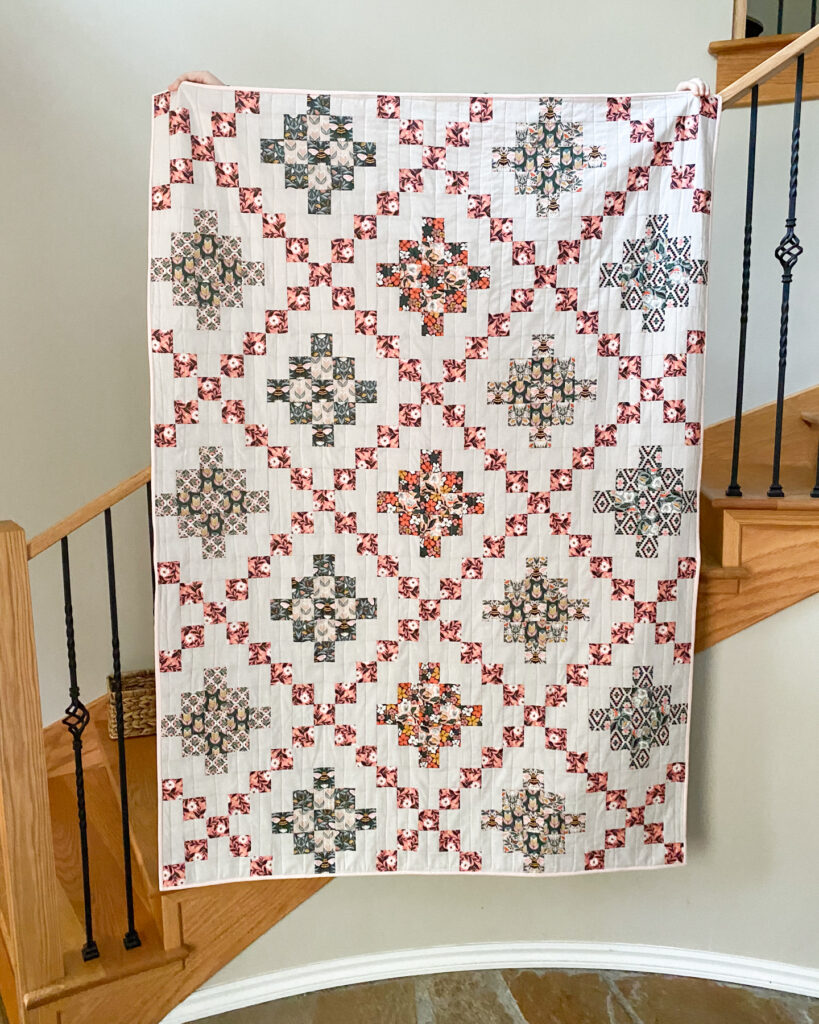 Bell Street Quilt Pattern made with Honey Garden fabric collection by Cloud9 Fabrics in lap size quilt