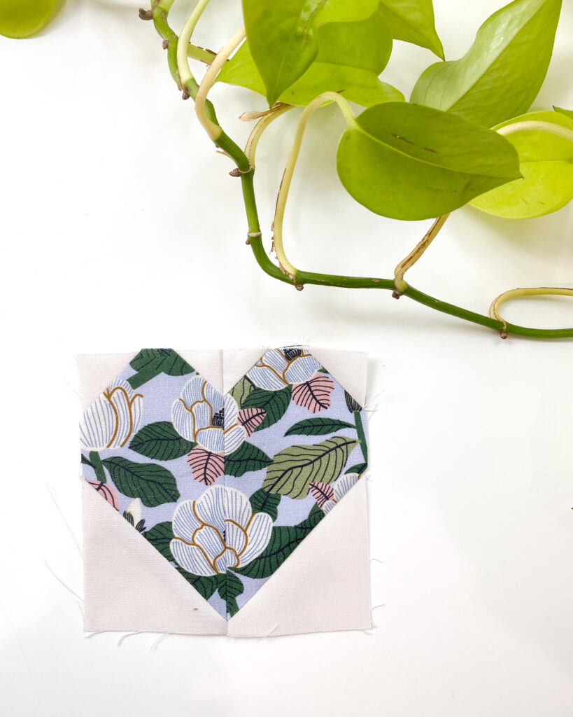 Stitch and flip technique used in the Heart Pillow Pattern – detail of heart quilt block