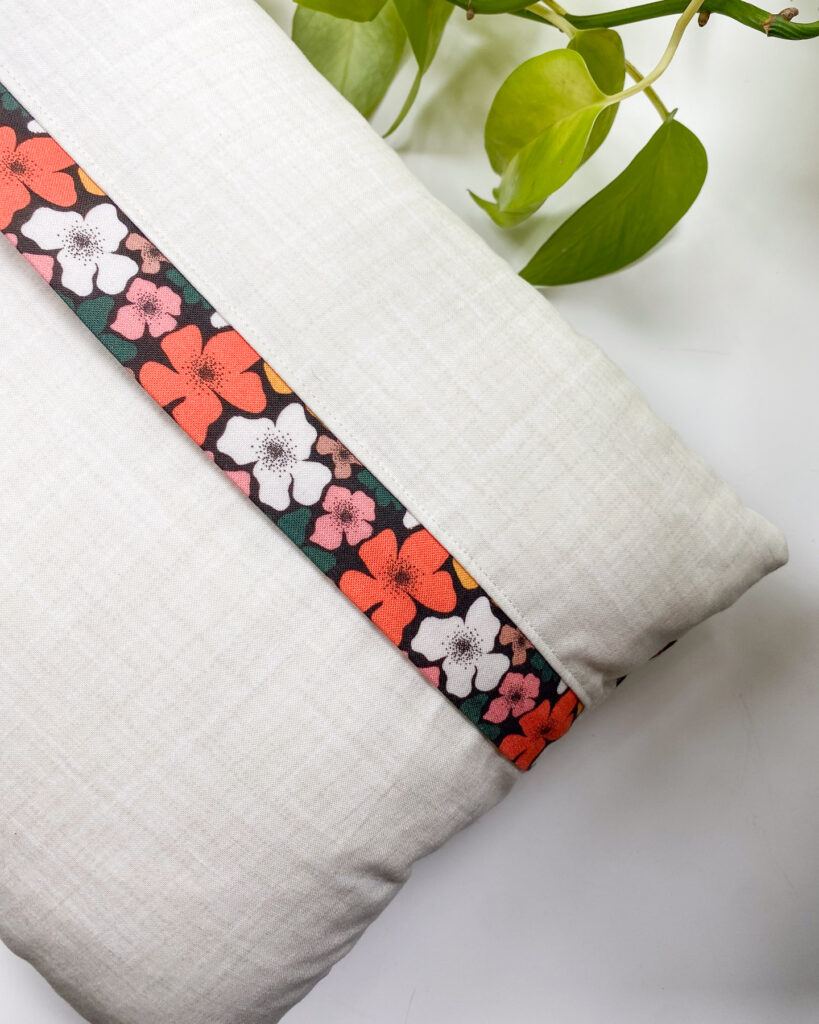 Back of the Honeycomb Pillow with lapped zipper closure and bright accent fabric, a beginner-friendly pillow sewing project