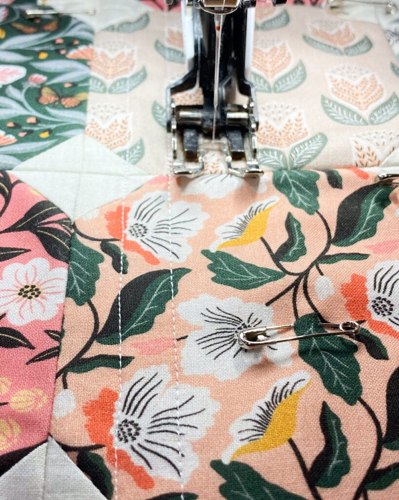 Close-up of straight-line quilting on the Honeycomb Pillow, spaced ½ inch apart for a clean, textured finish