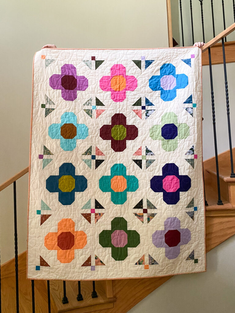 Gem Blossom quilt pattern in solid fabrics