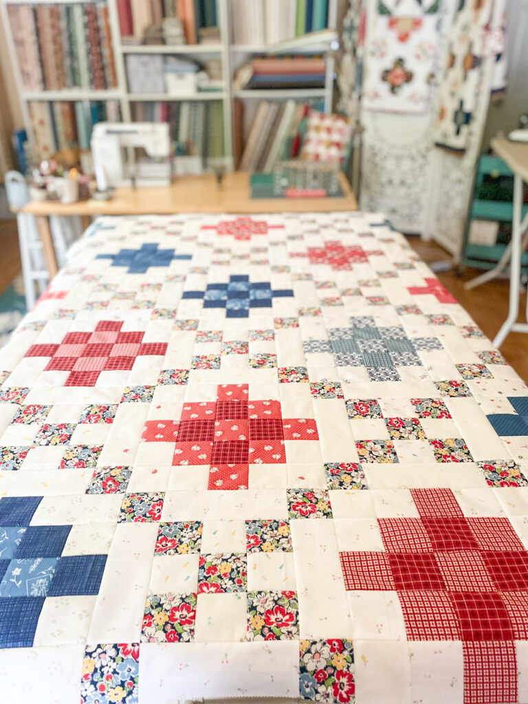 Scrappy Bell Street Quilt Pattern made with Lori Holt Bee Basics fabrics and low volume background prints