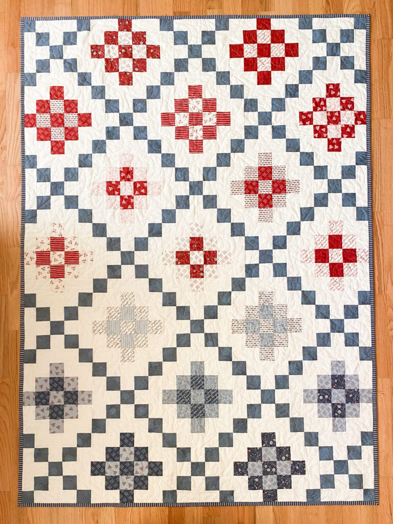 Bell Street Quilt Pattern made with Independence Day jelly roll by Sweetwater for Moda Fabrics in patriotic red white and blue
