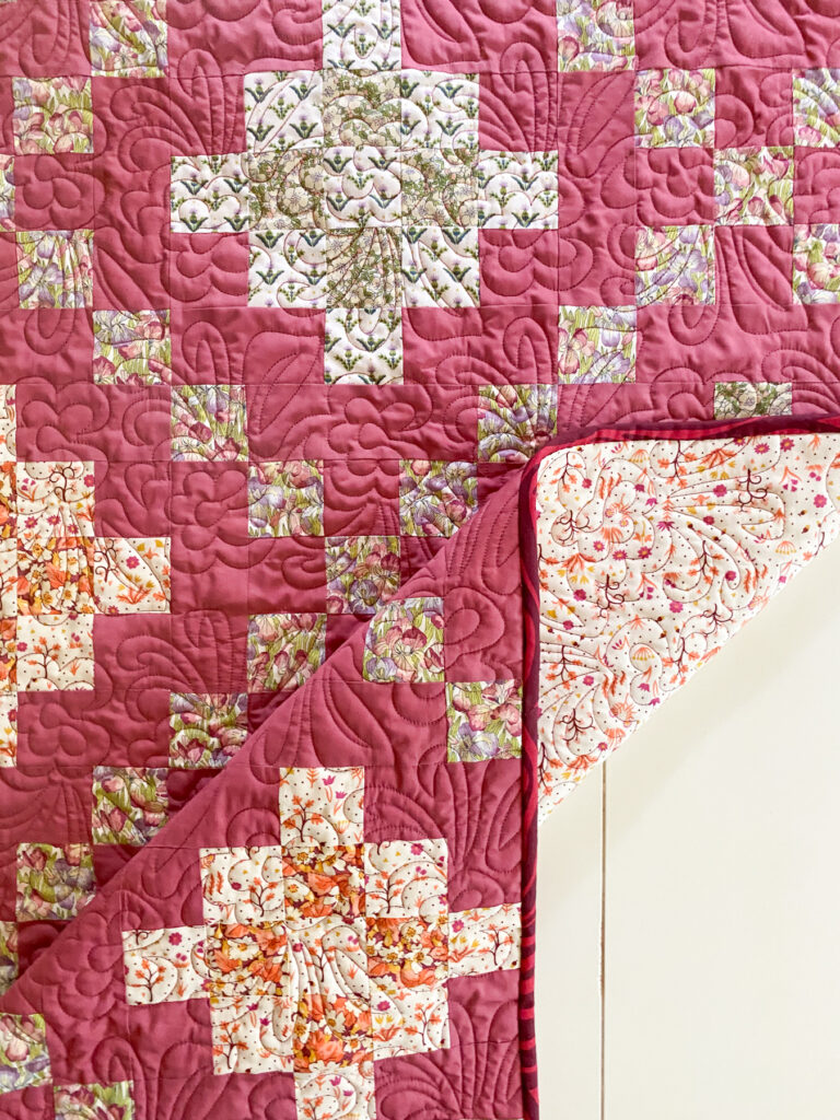 Bell Street Quilt Pattern Irish Chain quilt made with Liberty Fabrics floral prints and Art Gallery Fabrics background
